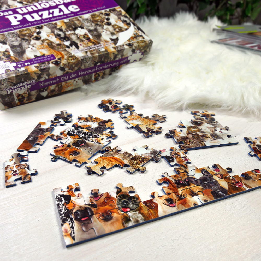 Unlösbares Puzzle - Katzen und Hunde