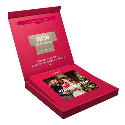Erlebnisgutschein in roter Geschenkbox Frohe Weihnachten